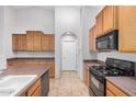 Spacious kitchen featuring ample cabinet space, tile floors, and modern appliances at 3756 E Camden Ave, San Tan Valley, AZ 85140