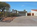 Charming single-story home featuring low maintenance desert landscaping and a spacious driveway at 5518 E Cambridge Ave, Phoenix, AZ 85008