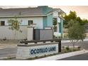 The Ocotillo Lane street sign with the view of the home's exterior in the background and new landscaping at 6710 N 9Th Dr, Phoenix, AZ 85013