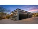 Modern detached garage with steel construction and desert views at 7686 E Stagecoach Pass Rd, Carefree, AZ 85377