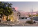 View of the home, neighboring homes, and street at 9812 E Karen Dr, Scottsdale, AZ 85260