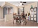 Cozy dining area featuring an open layout and views of the front door at 16528 W Isleta Ct, Surprise, AZ 85387