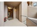 Welcoming front entrance featuring an open doorway, potted plants, and decorative touches at 36601 N Mule Train Rd # 40A, Carefree, AZ 85377