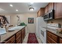 Bright kitchen with plenty of cabinets and counter space at 36601 N Mule Train Rd # 40A, Carefree, AZ 85377