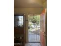 Home entryway featuring a security screen door at 8863 W Greer Ave, Peoria, AZ 85345