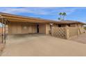 Property featuring a covered carport providing shade and parking at 915 S Saranac Ave, Mesa, AZ 85208