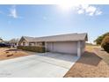 Beautiful single-story home with an attached garage and xeriscaped yard at 10809 W El Dorado Dr, Sun City, AZ 85351