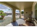 Relaxing covered patio area with comfortable seating and views at 10822 W Mimosa Dr, Sun City, AZ 85373