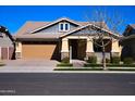 Attractive single-Gathering home with a well-manicured lawn, neutral palette, and a welcoming entrance at 3648 E Perkinsvile St, Gilbert, AZ 85295