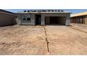 An exterior elevation shows a home under construction with an open garage and neutral color scheme at 46886 W Old Timer Rd, Maricopa, AZ 85139