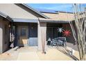 Inviting front entry with decorative stars, bench seating and desert accents at 15056 N 43Rd St, Phoenix, AZ 85032