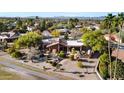 Lovely aerial view of the property with beautiful landscaping and desert-style yard at 18919 E Reata Ln, Rio Verde, AZ 85263