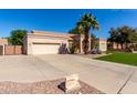 Single Gathering home featuring xeriscape front yard, concrete driveway, and a two car garage at 20386 E Bronco Dr, Queen Creek, AZ 85142