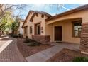 Charming home featuring stone accents and well-maintained landscaping at 2454 E Vermont Dr, Gilbert, AZ 85295