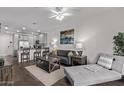 Comfortable open-concept living room with a stylish sofa and inviting chaise lounge at 2511 W Queen Creek Rd # 323, Chandler, AZ 85248