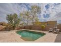 Backyard featuring a sparkling in-ground pool, perfect for hot days and entertaining guests at 3747 W Memorial Dr, Phoenix, AZ 85086