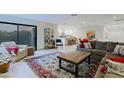 Bright living room with access to a patio, showcasing an open layout at 8138 E Via De La Escuela --, Scottsdale, AZ 85258