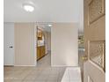 Inviting entryway featuring neutral paint, tile floors, and a view into the adjacent kitchen at 829 S Revolta Cir, Mesa, AZ 85208