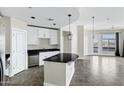 Bright kitchen with stainless appliances, granite countertops, island and dining area at 945 E Playa Del Norte Dr # 5005, Tempe, AZ 85288