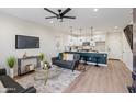 Bright and airy living room featuring an open-concept design with a modern kitchen and stylish furnishings at 1642 E Monte Vista Rd # 9, Phoenix, AZ 85006