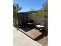 Cozy patio with a privacy screen, comfortable seating, and a peaceful outdoor setting at 1642 E Monte Vista Rd # 9, Phoenix, AZ 85006