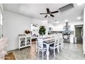 Open-concept space with a dining area that flows into the kitchen, complete with modern finishes and decor at 3129 W Pierce St, Phoenix, AZ 85009