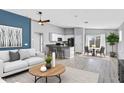 Bright open-concept living space boasts sleek modern finishes and abundant natural light at 36852 N Yellowstone Dr, San Tan Valley, AZ 85140