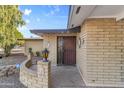 Inviting front entryway with decorative details and secure security door at 734 S Edgewater Dr, Mesa, AZ 85208