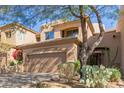 Charming home with a two-car garage and desert landscaping at 9715 N Azure Ct # 4, Fountain Hills, AZ 85268