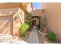 Landscaped walkway leading to front door at 9715 N Azure Ct # 4, Fountain Hills, AZ 85268