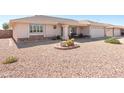 Inviting home featuring desert landscaping and a well-maintained exterior; the perfect curb appeal at 11413 E Neville Ave, Mesa, AZ 85209