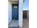 Stylish blue front door, providing an inviting entryway to the home at 1588 N Pueblo Dr, Apache Junction, AZ 85120