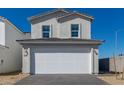 Charming home featuring a two-car garage, complemented by a well-maintained yard and a sunny, blue sky at 1588 N Pueblo Dr, Apache Junction, AZ 85120