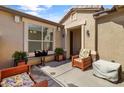 Relaxing outdoor patio featuring comfortable seating and stylish decor at 18382 N Arbor Dr, Maricopa, AZ 85138