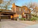 Beautiful two-story home showcasing a grand entrance and attached two car garage at 3912 E Williams Dr, Phoenix, AZ 85050