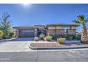 Lovely single-story home with an attached garage and attractive desert landscaping at 4750 S Rhodium Ln, Mesa, AZ 85212