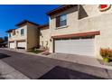 Condominium building showcasing attached garages and inviting front outdoor space at 5726 N 10Th St # 5, Phoenix, AZ 85014