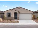 Inviting single-story home featuring a neutral color palette and a two-car garage in a desirable location at 8555 W Trenton Ct, Florence, AZ 85132