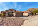 Well-maintained single-story home featuring desert landscaping and a two-car garage at 1146 N 89Th St, Mesa, AZ 85207