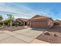 Well-maintained single-story home featuring desert landscaping and a two-car garage at 1146 N 89Th St, Mesa, AZ 85207