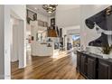 Spacious entryway boasts soaring ceilings, statement lighting, and modern staircase at 12026 N 138Th St, Scottsdale, AZ 85259