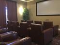 Comfortable theater room with plush seating, movie screen, and great lighting at 1367 S Country Club Dr # 1315, Mesa, AZ 85210