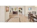 Hallway featuring beautiful tile floors, and views into other rooms creating an open feel at 5024 E Le Marche Ave, Scottsdale, AZ 85254