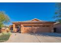 Lovely single story home with a three car garage and low maintenance desert landscaping at 7138 W Buckskin Trl, Peoria, AZ 85383