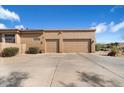 A two-car garage with an expansive driveway at 7848 E Parkview Ln, Scottsdale, AZ 85255