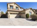 Spacious home with a large driveway and a three car garage, offering ample parking at 2428 E Iris Dr, Chandler, AZ 85286