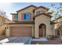 Two-story home showcasing charming architectural details and a well-manicured front yard at 6713 E Elmwood St, Mesa, AZ 85205