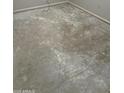 Bright bedroom with stained concrete floors and an electrical outlet at 1111 E Village Circle N Dr, Phoenix, AZ 85022