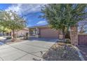 Charming single-story home with a well-maintained front yard and inviting curb appeal at 1541 W Crape Rd, San Tan Valley, AZ 85140