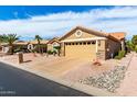 Charming single-story home featuring desert landscaping and a spacious two-car garage at 15492 W Whitton Ave, Goodyear, AZ 85395